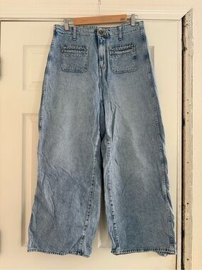 Old Navy light blue denim jeans with tan stitching